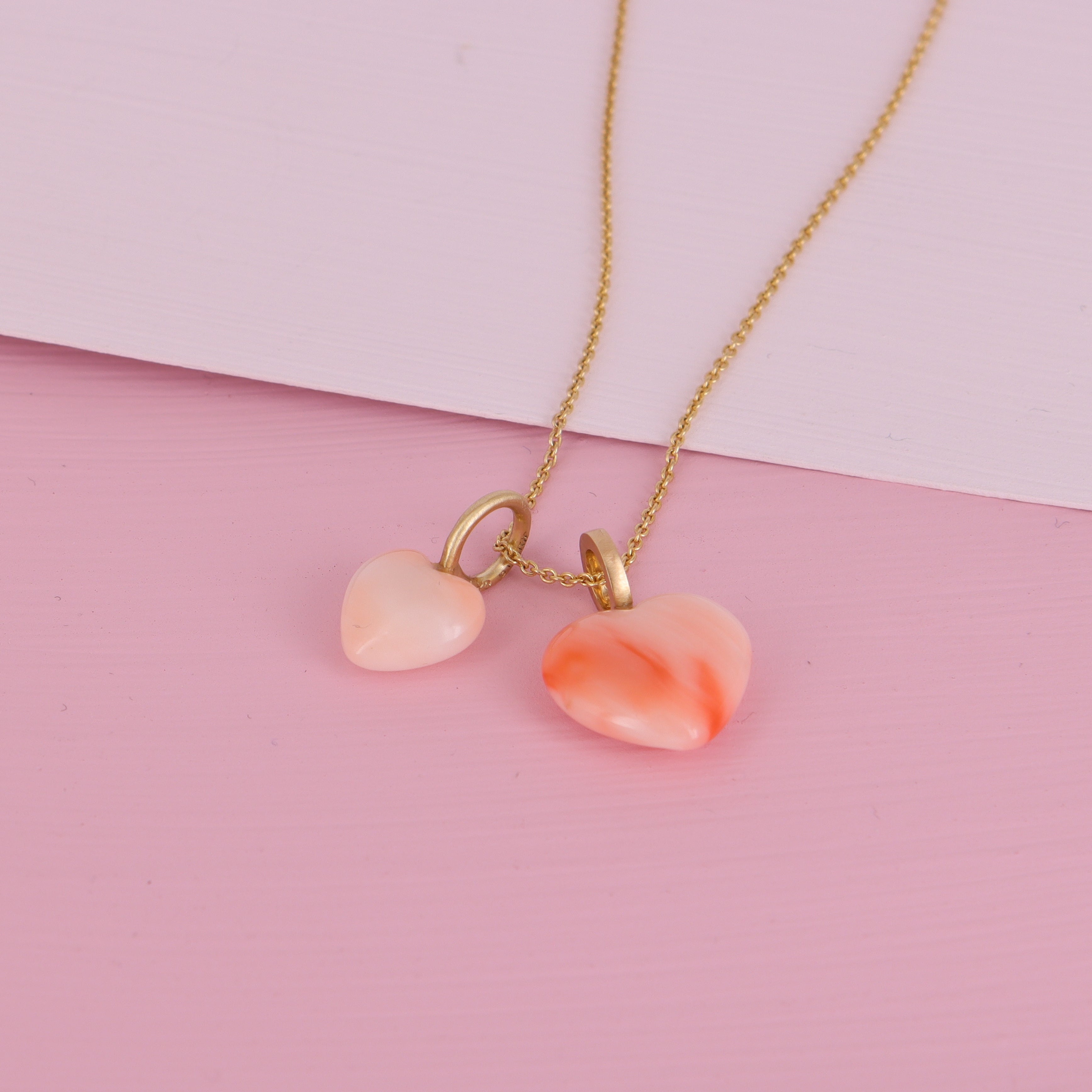 14 kt guld & lyserød koralhjerte.