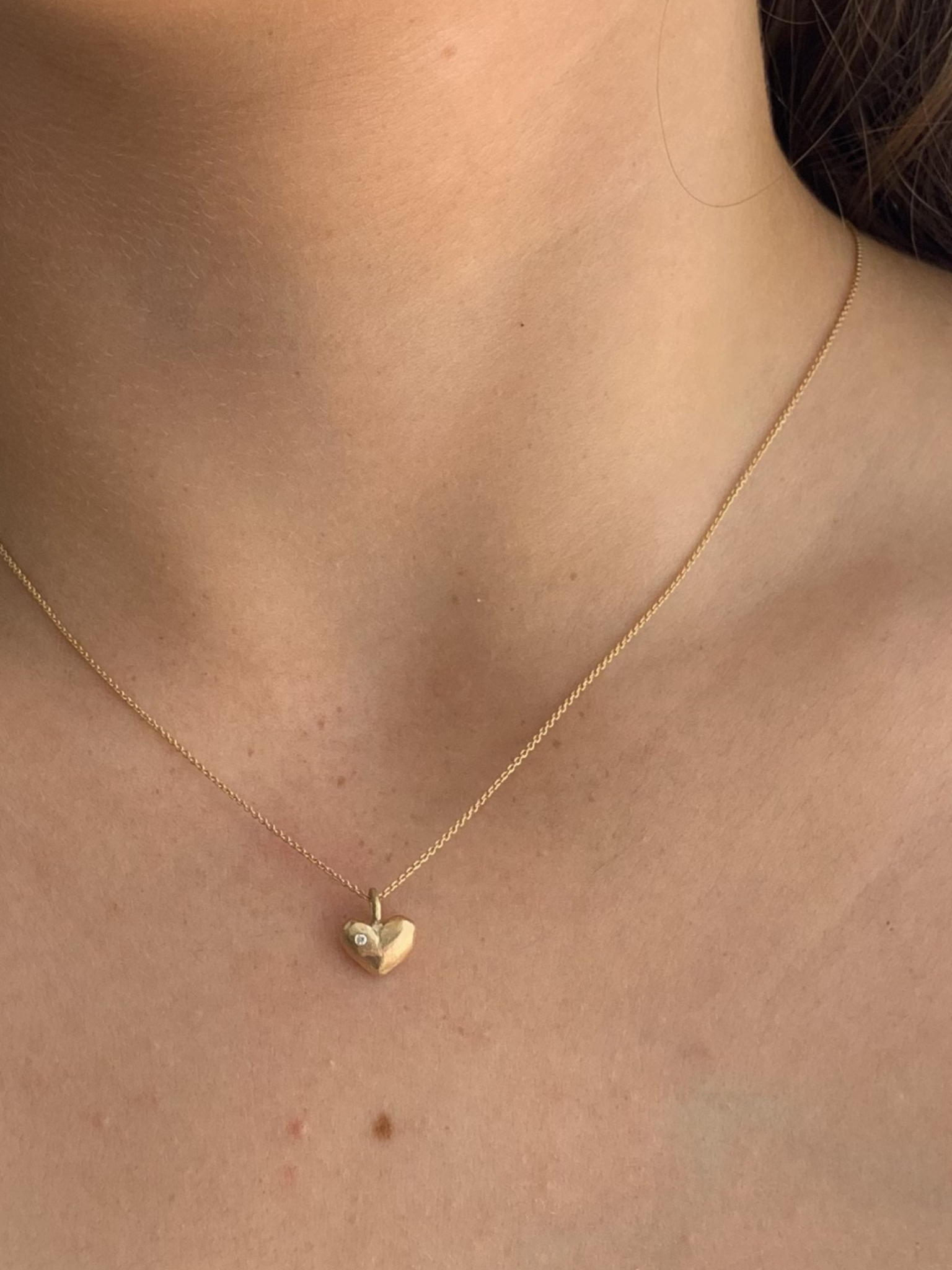 14 kt Guld hjerte med facetter.